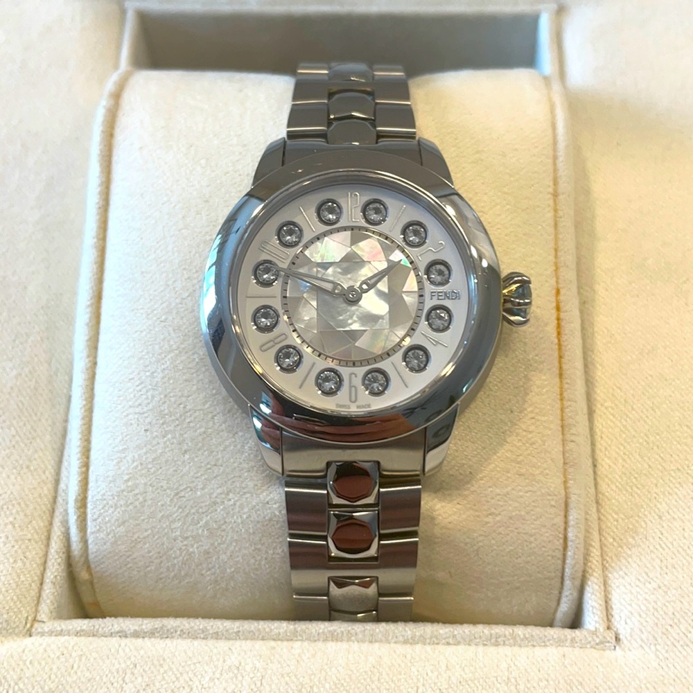 Fendi timepiece. Spinel and topaz dial. Quartz watch